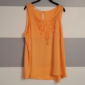 Bright orange tank with front cut out detail